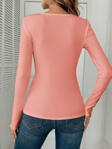 Coral ribbed long sleeve T-shirt featuring lace cuffs and rhinestone details back view