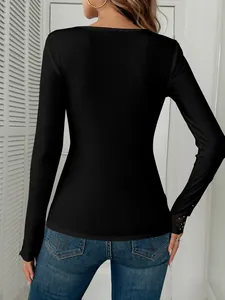 Back view of black ribbed long-sleeve T-shirt with lace rhinestone cuff details