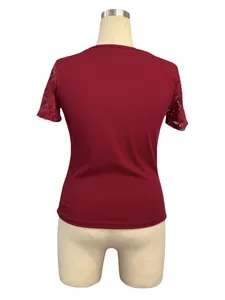 Back view of wine red ribbed short sleeve top featuring delicate lace details on sleeves.