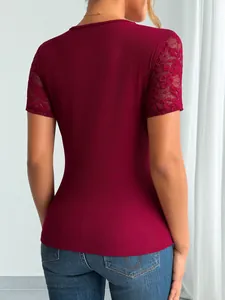 Back view of burgundy ribbed top with elegant floral lace sleeves and slim fit design
