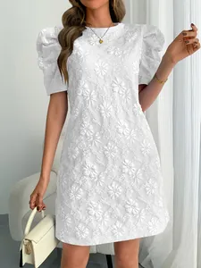 Detailed shot of white floral jacquard crew neck mini dress with vintage puff sleeves