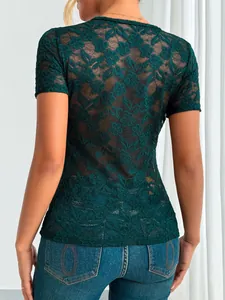 Detailed back view of dark green sheer lace short sleeve top with floral embroidery
