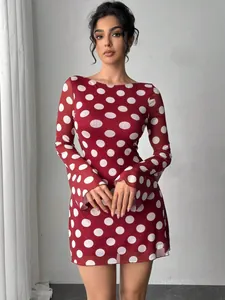 Elegant red polka dot mesh mini dress featuring stylish flare sleeves for women's fashion