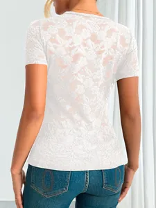 Back view of a slim-fitting white lace short sleeve top featuring intricate floral patterns