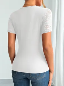Detail view of white ribbed top with floral lace short sleeves from behind