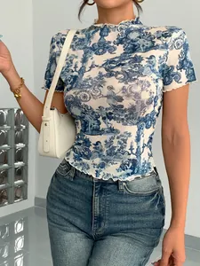 Elegant blue toile de jouy printed mesh top featuring lettuce edge details and slim fit