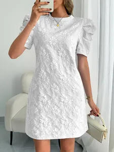 Elegant white puff sleeve mini dress featuring a vintage floral jacquard texture