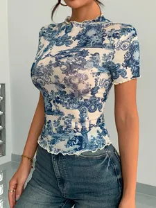 Detail of the blue Toile de Jouy mesh T-shirt featuring delicate lettuce trim edges.