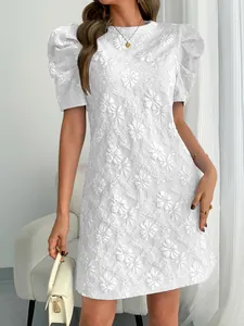 Elegant white retro mini dress featuring puff sleeves and floral textured jacquard fabric