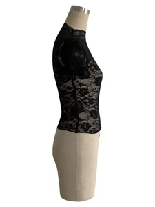Side view detail of black lace slim-fit T-shirt with mock neck and floral pattern.