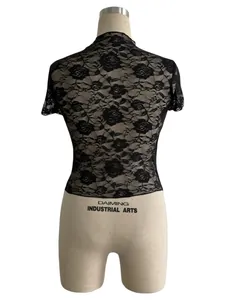 Detailed back view of a black floral lace slim-fit t-shirt displayed on a mannequin torso