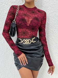 Detail view of burgundy sheer mesh top with black spiderweb pattern for women.