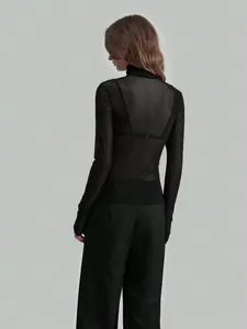 Back view of black sheer mesh turtleneck top with slim fit long sleeves for women