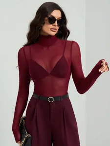 Detail shot of a stylish burgundy mock neck mesh top with slim fit and long sleeves