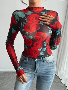 Sheer mesh long sleeve top featuring a bold red rose floral print and mock neck