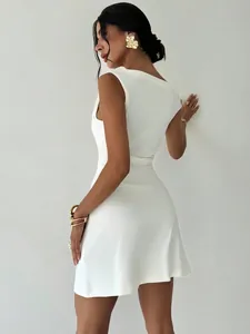 Rear view of white sleeveless slim fit dress with irregular neckline and double layers