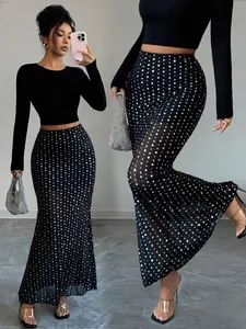 Elegante gonna lunga in mesh con paillettes nere a vita alta per le vacanze