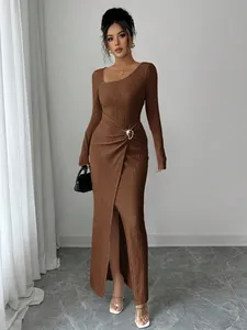 Elegant brown textured knit maxi dress with asymmetric neckline and side slit detail