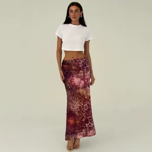 A full length view of vintage print high-waisted mesh fishtail maxi skirt for women