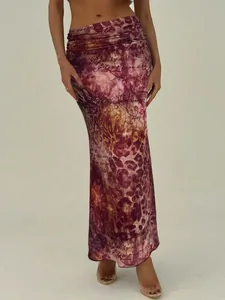 Full view of vintage leopard print mesh maxi skirt with elegant cursive pattern design