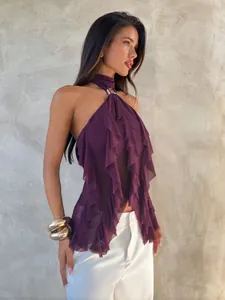 Detail of purple mesh halter top featuring vertical ruffles and sheer fabric texture
