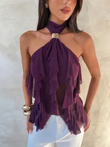 Detailed view of a purple mesh halter neck top featuring tiered ruffles and golden buckle