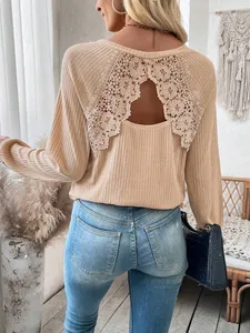 Beige long sleeve ribbed top for women featuring elegant lace patchwork and hollow back detail
