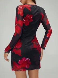 Slim fit mesh long sleeve mini dress with red floral print on black background, back view