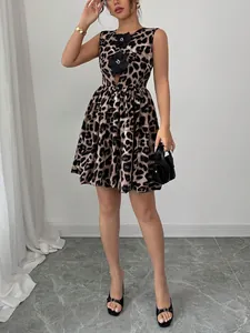 Chic sleeveless leopard print mini dress featuring stylish 3D flower applique for summer