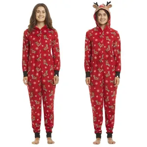 Cozy red hooded Christmas onesie featuring festive reindeer and snowflake prints
