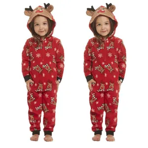 Close-up of children's Christmas hooded onesie featuring festive reindeer and snowflake prints