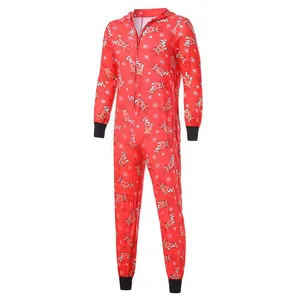 Detailed view of red Christmas hooded onesie with reindeer and snowflake prints