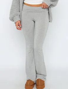 Detailed view of comfortable grey low waist flared pants for women with soft texture