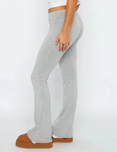 Detail view of heather grey low waist flare yoga pants for women with slim fit design