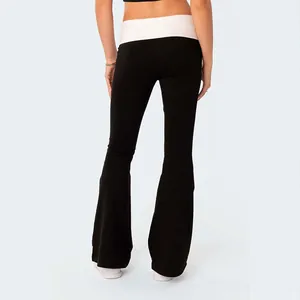 Professional women's low waist flare pants with white contrast waistband and slim fit design