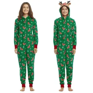 Detail view of a women's Christmas hooded onesie with festive reindeer and snowflake prints