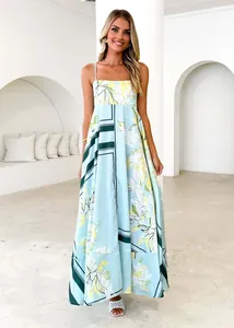 Elegant light blue floral print maxi dress featuring high waist and spaghetti straps detail