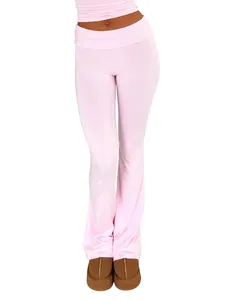Detailed view of fashionable pink low-rise flare pants with slim-fit design for women.