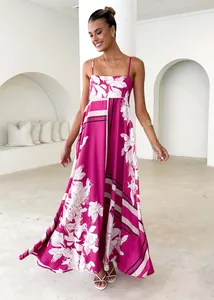 Floral print backless spaghetti strap maxi dress with a high waist A-line silhouette