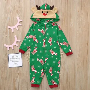 Close-up detail of the reindeer pattern and hooded design on this festive baby jumpsuit.