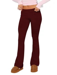 Close-up of burgundy low-rise flare pants with slim fit and stylish bell bottom design