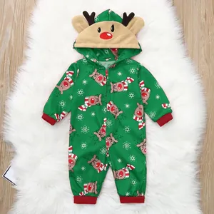 Detail of baby Christmas hooded romper with reindeer and snowflake prints