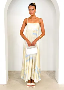 Full-length view of a summer floral print spaghetti strap maxi dress on a model.