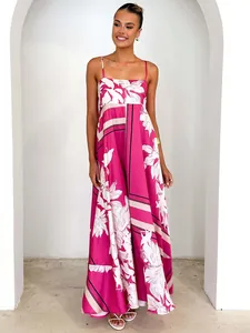 Vibrant pink floral print maxi dress with spaghetti straps and high waist A-line skirt