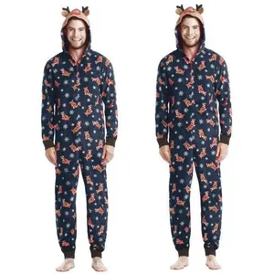 Full body view of men's navy blue Christmas reindeer print hooded onesie pajama set
