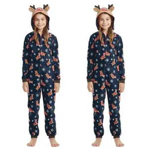 Close-up detail of children's Christmas hooded onesie with reindeer and snowflake prints