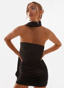 Elegant black strapless mini dress with matching neck sash detail