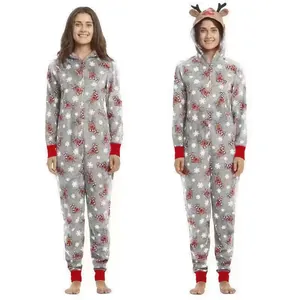 Detailed view of women's Christmas hooded onesie with reindeer and snowflake print