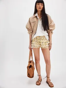 Sweet floral tiered ruffle mini skirt with lace edges for a stylish spring summer look.