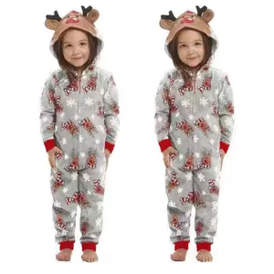 Detail of children's Christmas hooded onesie with festive reindeer and snowflake prints